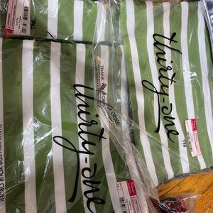 Set of three Green cabana stripe cinch sacs